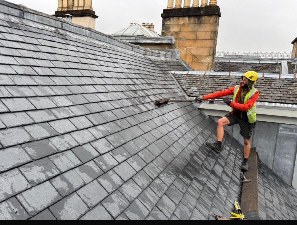 Slate roof project in progress by ARC Developments
