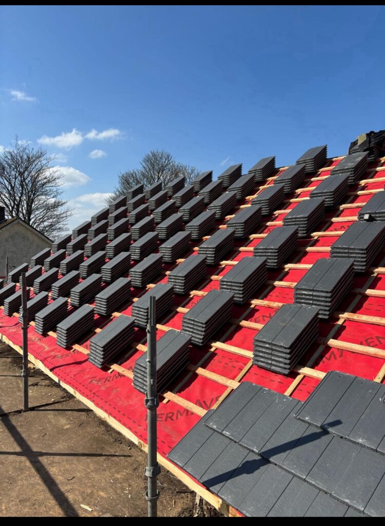 Slate tiles set up ready to tile the roof at Craigiehall Estate Property Development Project